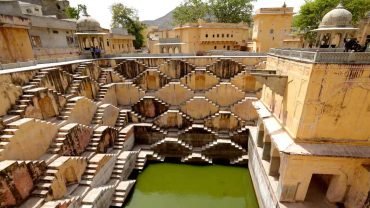 The symmetrical design and dramatic play of light and shadows make this stepwell a paradise for photographers. Whether capturing the intricate stairways or the reflections in the water, every angle presents a mesmerizing shot. If you’re planning a Rajasthan trip, this spot is a must-visit for stunning Instagram-worthy pictures.