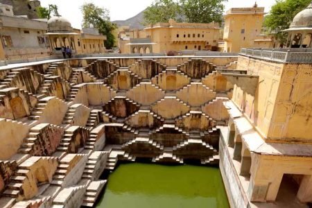 The symmetrical design and dramatic play of light and shadows make this stepwell a paradise for photographers. Whether capturing the intricate stairways or the reflections in the water, every angle presents a mesmerizing shot. If you’re planning a Rajasthan trip, this spot is a must-visit for stunning Instagram-worthy pictures.